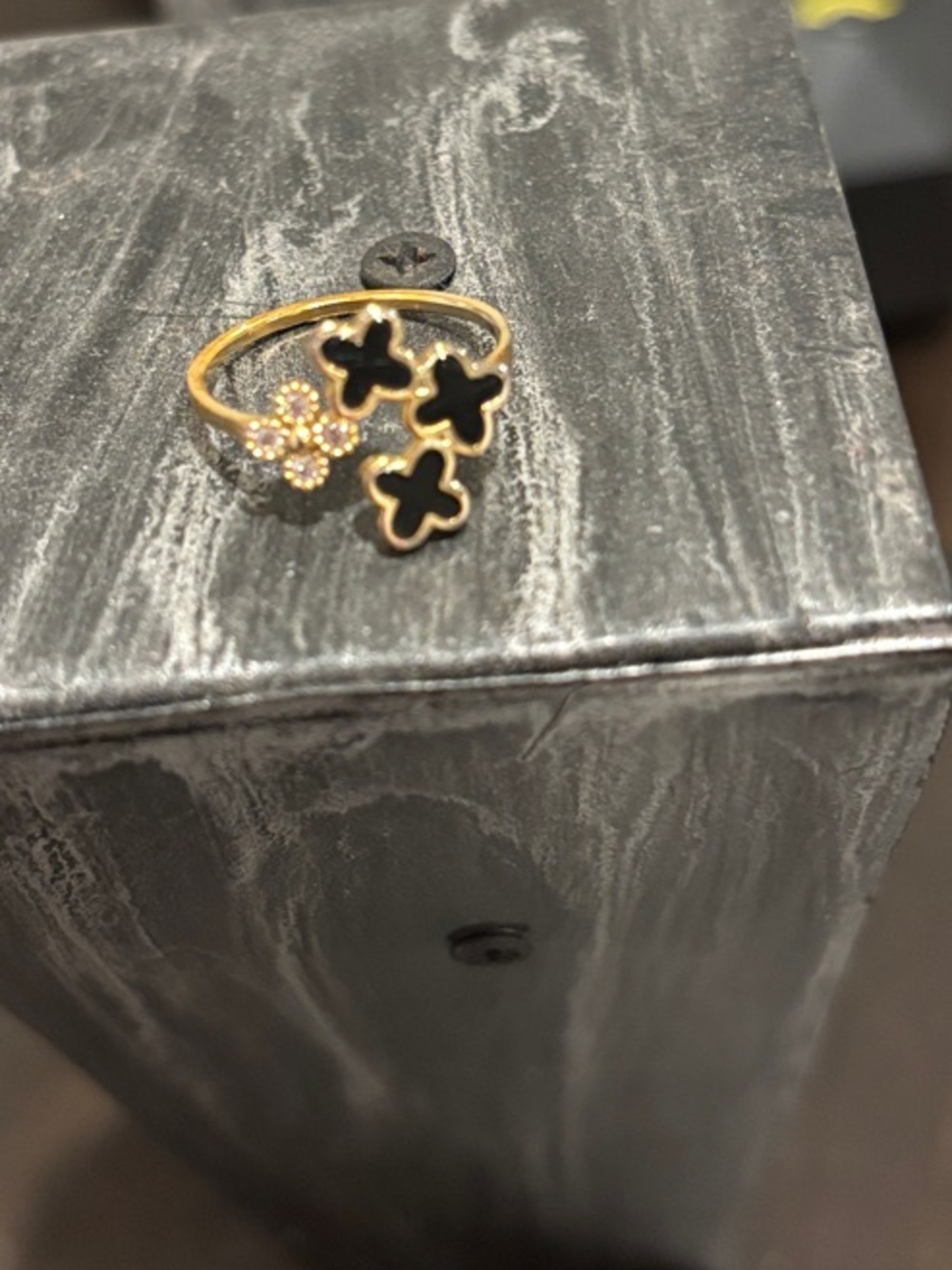 Gold-Tone Floral Cluster Ring with Black Enamel and Crystal Accent